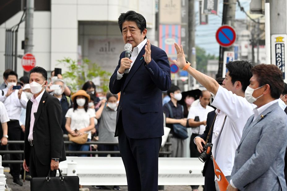 Former Prime Minister Shinzo Abe speaks moments before being shot in front of the Yamato-Saidaiji Station in Nara, Japan, on Friday, July 8.