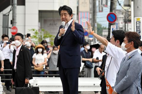 Former Prime Minister Shinzo Abe speaks moments before being shot in front of Yamato-Saidaiji Station in Nara, Japan, on July 8.