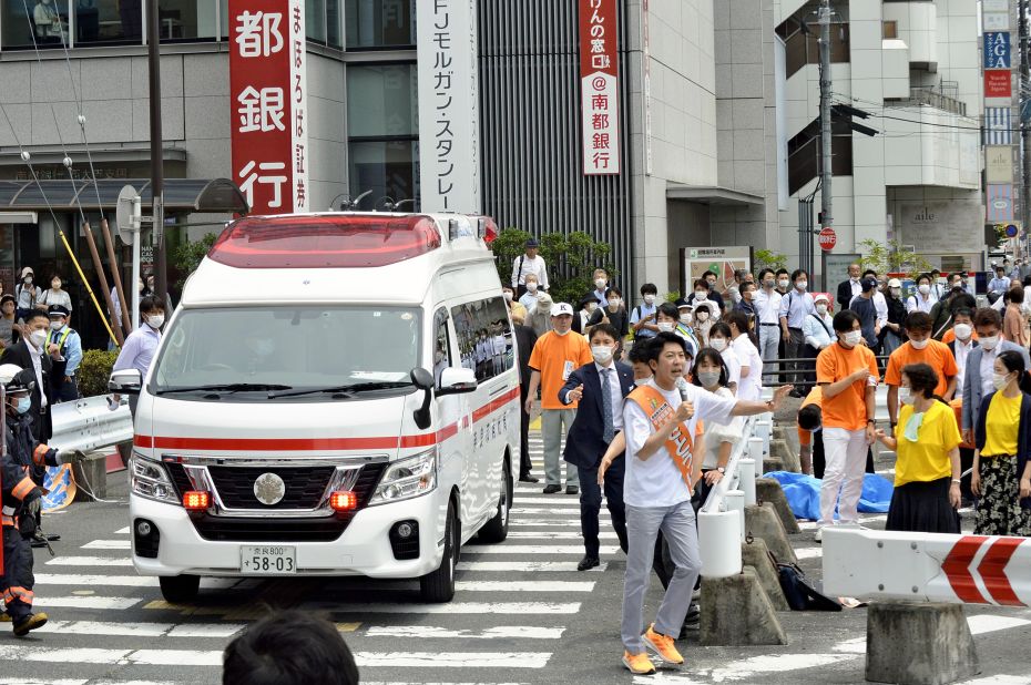 An ambulance carries Abe from the shooting site in Nara.