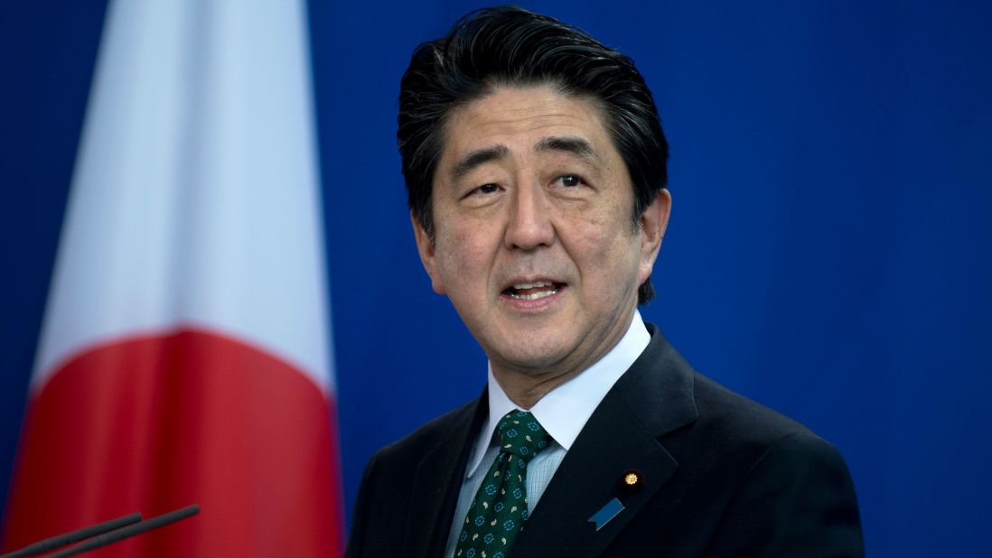 Then-Japanese Prime Minister Shinzo Abe addresses the media during a news conference in 2014.