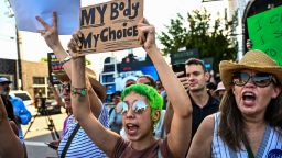 Abortion rights activists rally after the US Supreme Court striked down the right to abortion, in Miami, Florida, on June 24, 2022. (Photo by CHANDAN KHANNA / AFP) (Photo by CHANDAN KHANNA/AFP via Getty Images)