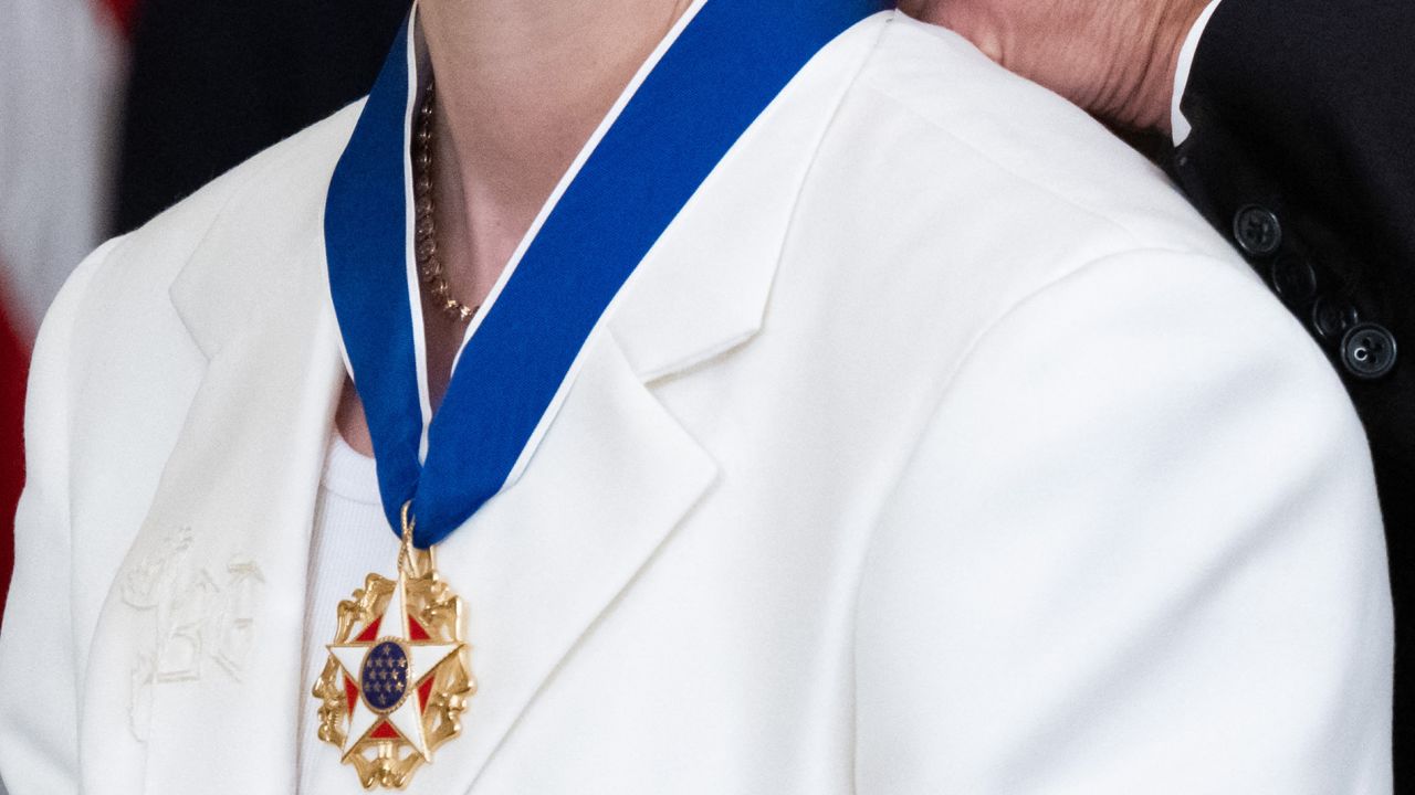 Rapinoe's suit is embroidered with the initials 'BG,' paying tribute to WNBA player Brittney Griner.