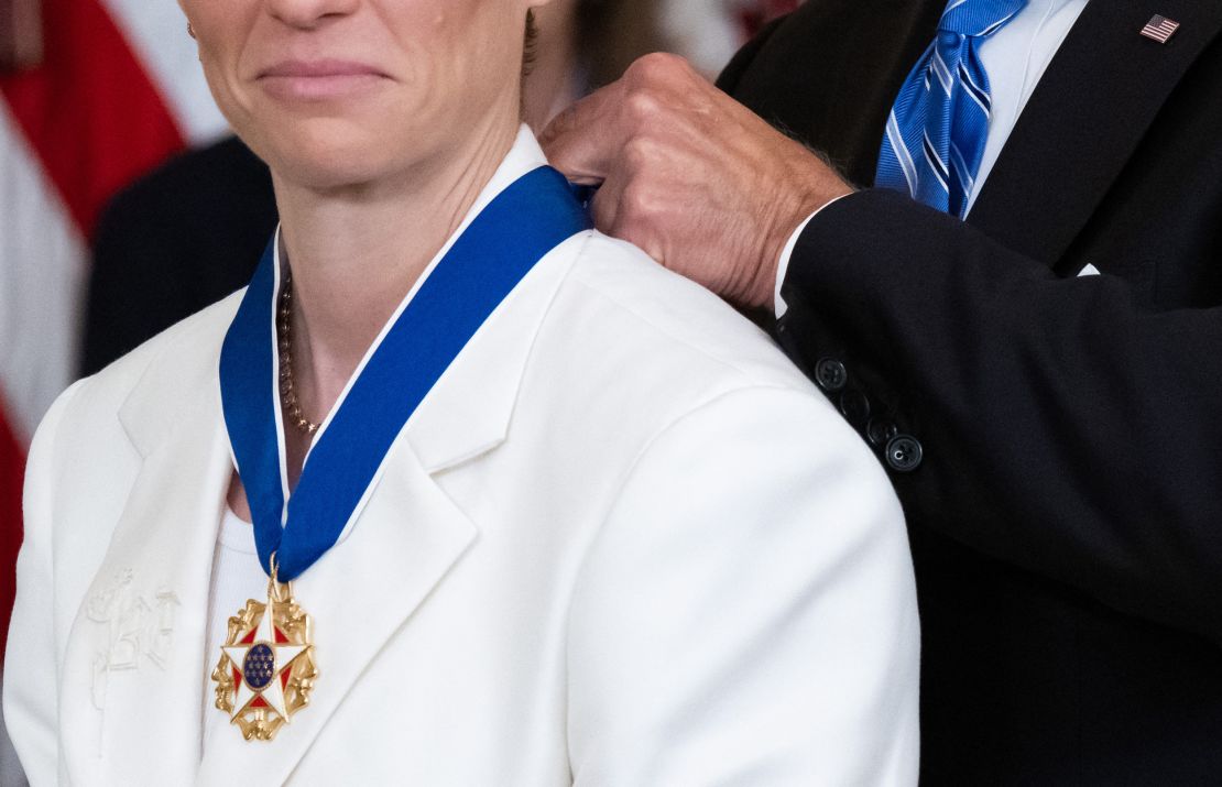 Rapinoe's suit is embroidered with the initials 'BG,' paying tribute to WNBA player Brittney Griner.