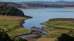 A trickle of water flows into Lake Mendocino. The reservoir's water level dropped to 29% capacity in early June.