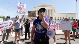 Abortion-rights activists protest outside the Supreme Court in Washington, Monday, July 4, 2022. The Supreme Court has ended constitutional protections for abortion that had been in place nearly 50 years, a decision by its conservative majority to overturn the court's landmark abortion cases. 