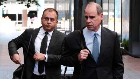 Former Theranos COO Ramesh "Sunny" Balwani and his legal team leave the Robert F. Peckham Federal Building on July 7, 2022 in San Jose, California.