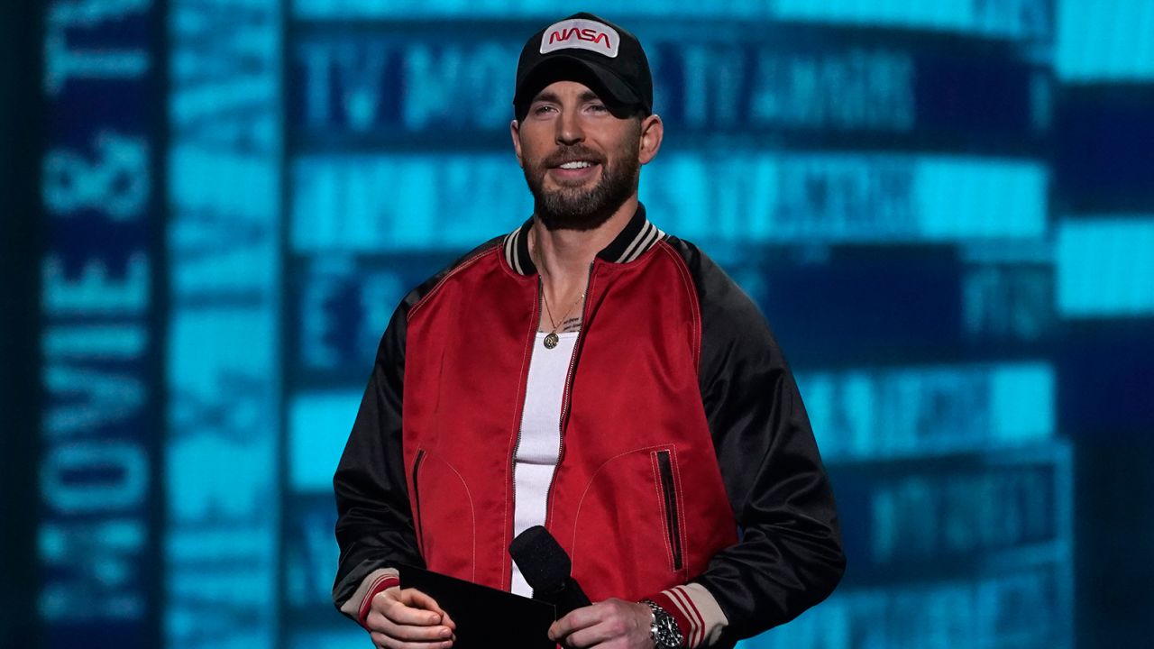 Chris Evans wearing a hat with the NASA "worm" logo at the MTV Movie and TV Awards on Sunday, June 5, 2022, at the Barker Hangar in Santa Monica, Calif. 