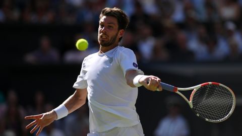 Norrie lines up a forehand against Djokovic on Centre Court.