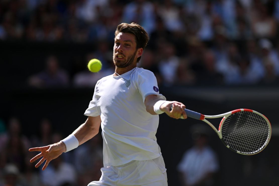 Norrie lines up a forehand against Djokovic on Centre Court. 