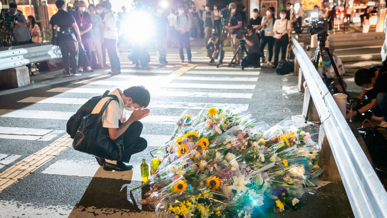 A man prays at the site where Japan's former Prime Minister Shinzo Abe was shot during an election campaign on July 8 in Nara.