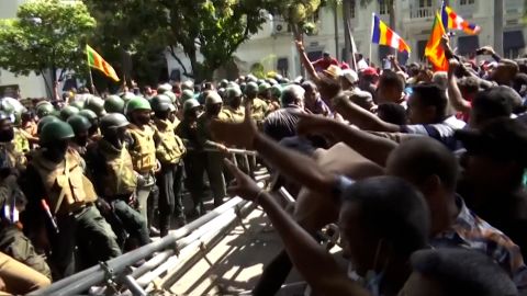 Heated scuffles erupted Saturday between police and angry protesters, as troops used tear gas and water cannons to push back demonstrators who breached security barriers.
