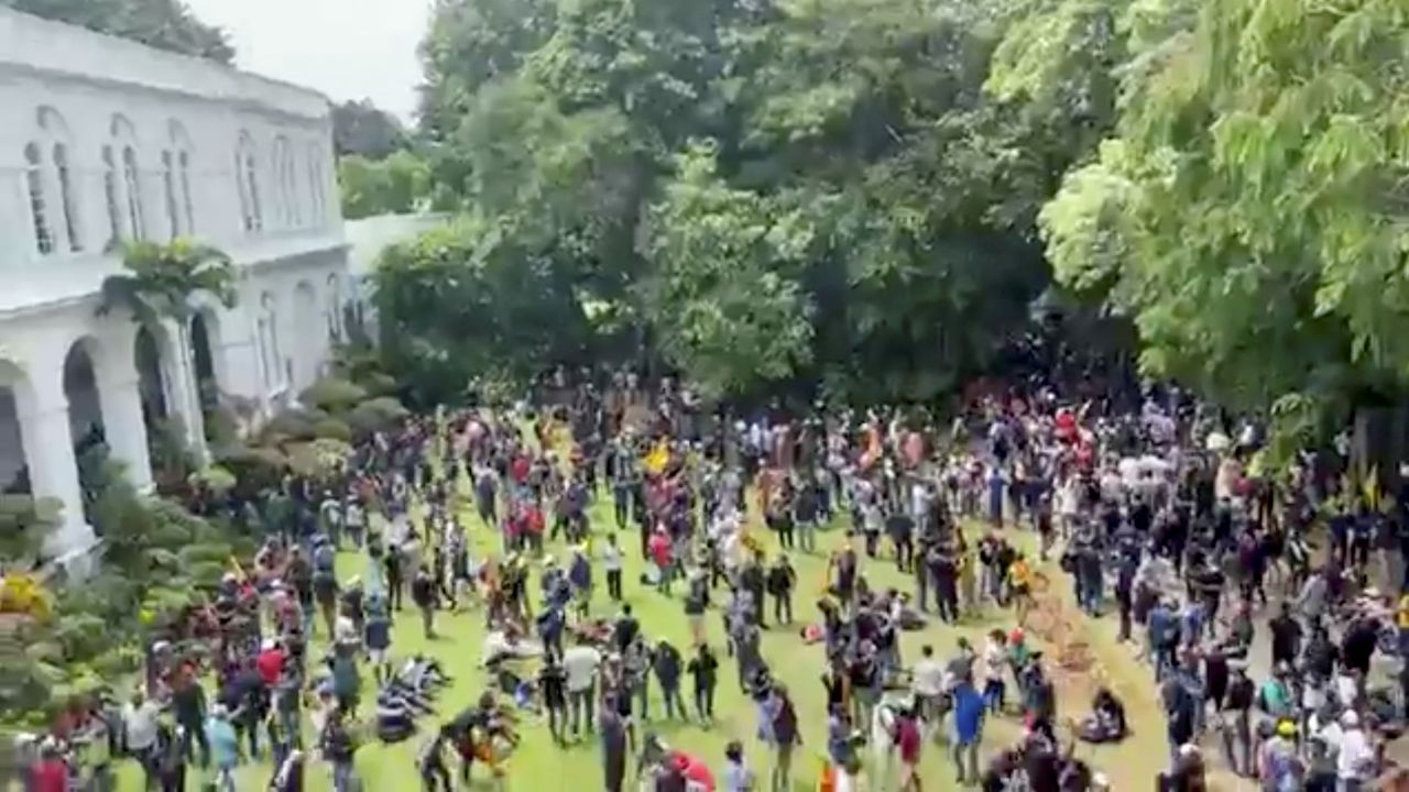 Demonstrators protest inside the President?s House, after President Gotabaya Rajapaksa fled, amid the country's economic crisis, in Colombo, Sri Lanka, in this screengrab obtained from social media video on July 9, 2022. News Cutter via REUTERS ATTENTION EDITORS - THIS IMAGE HAS BEEN SUPPLIED BY A THIRD PARTY. MANDATORY CREDIT. NO RESALES. NO ARCHIVES.