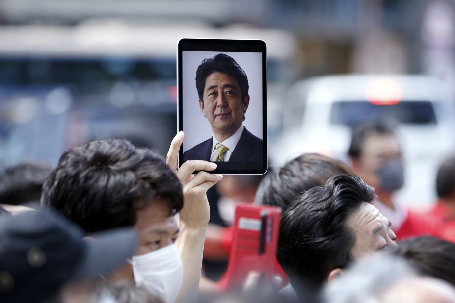 A photo of Abe is displayed on a tablet computer at an election campaign event in Yokohama, Japan, on Saturday.