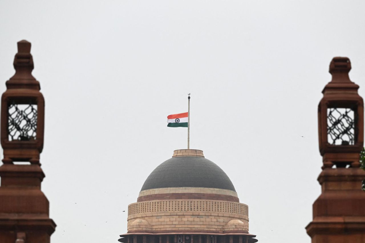 The Indian flag flies at half-staff at the presidential palace in New Delhi on Saturday.