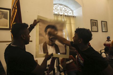 Protesters gather inside the President's House on Saturday.