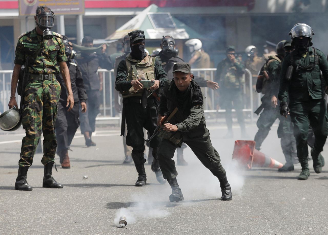 Police use tear gas to disperse protesters Saturday.