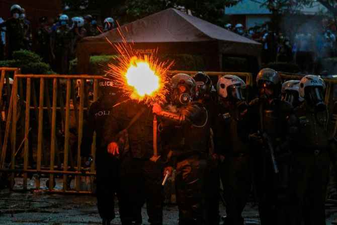 Police fire tear gas at university students during a protest on Friday.