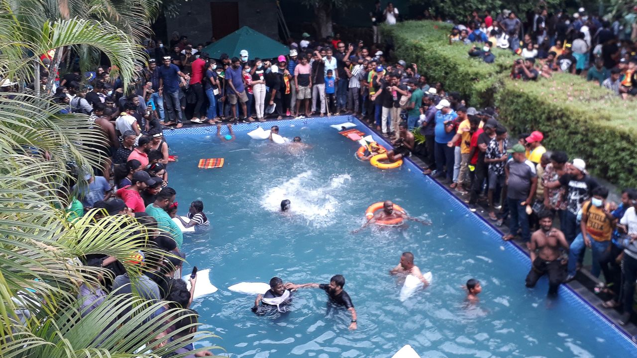 Protesters take over the compound of Sri Lanka's Presidential Palace in Colombo on Saturday.