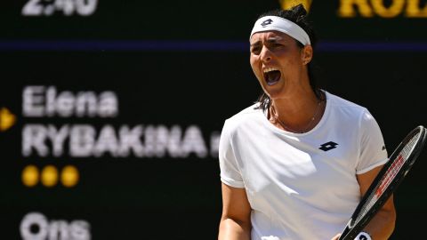 Jabeur celebrates winning a point against Rybakina.