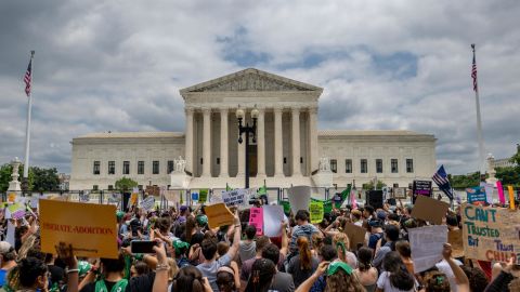 People protest in response to the Dobbs v Jackson Women's Health Organization ruling in front of the US Supreme Court on June 24, 2022 in Washington, DC. 