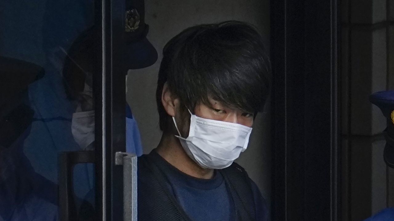 Tetsuya Yamagami, the suspect in the assassination of Shinzo Abe, walks out of a police station in Nara on July 10.
