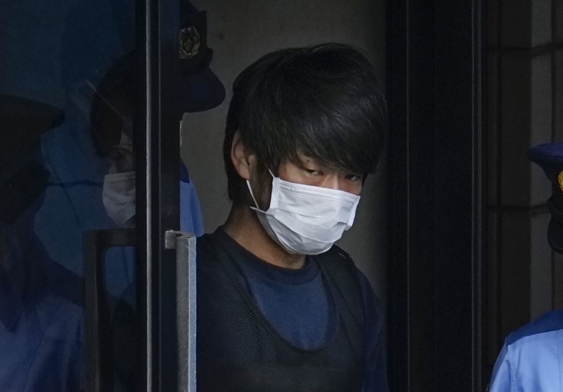Tetsuya Yamagami, the suspect in the assassination of Shinzo Abe, walks out of a police station in Nara on July 10.