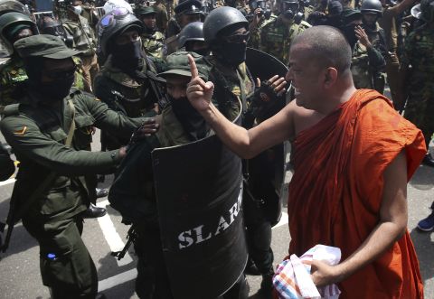 A Buddhist monk takes part in Saturday's protest.