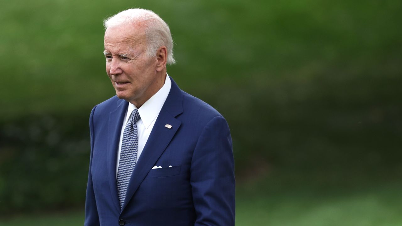 US President Joe Biden walks on the South Lawn prior to his departure from the White House on July 8, 2022, in Washington, DC. 
