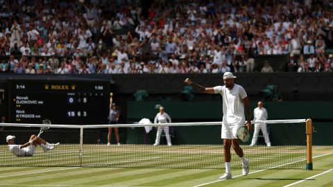 Kyrgios celebrates after winning a point against Djokovic.