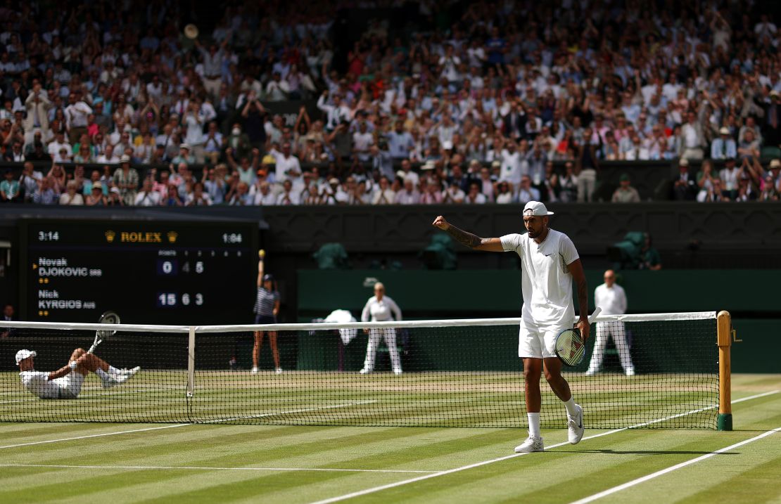Kyrgios celebrates after winning a point against Djokovic.