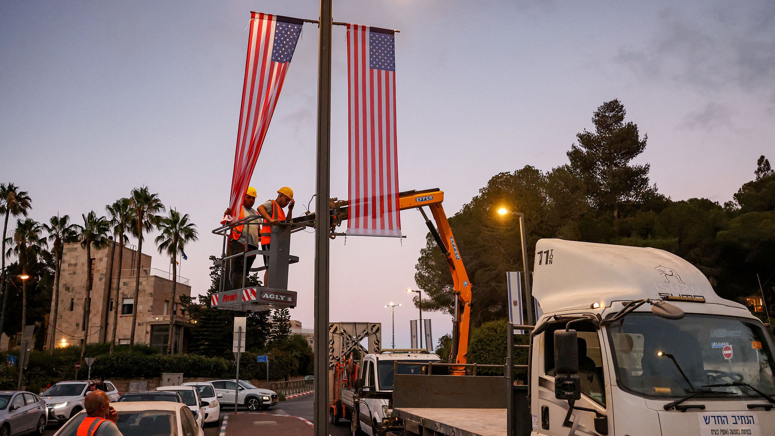 US flags are hung up along streets by the Jerusalem municipality on July 10 ahead of US President Joe Biden's upcoming visit. 