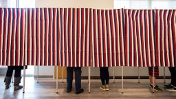 Voters fill in their ballots at polling booths in Concord, New Hampshire, on November 3, 2020.