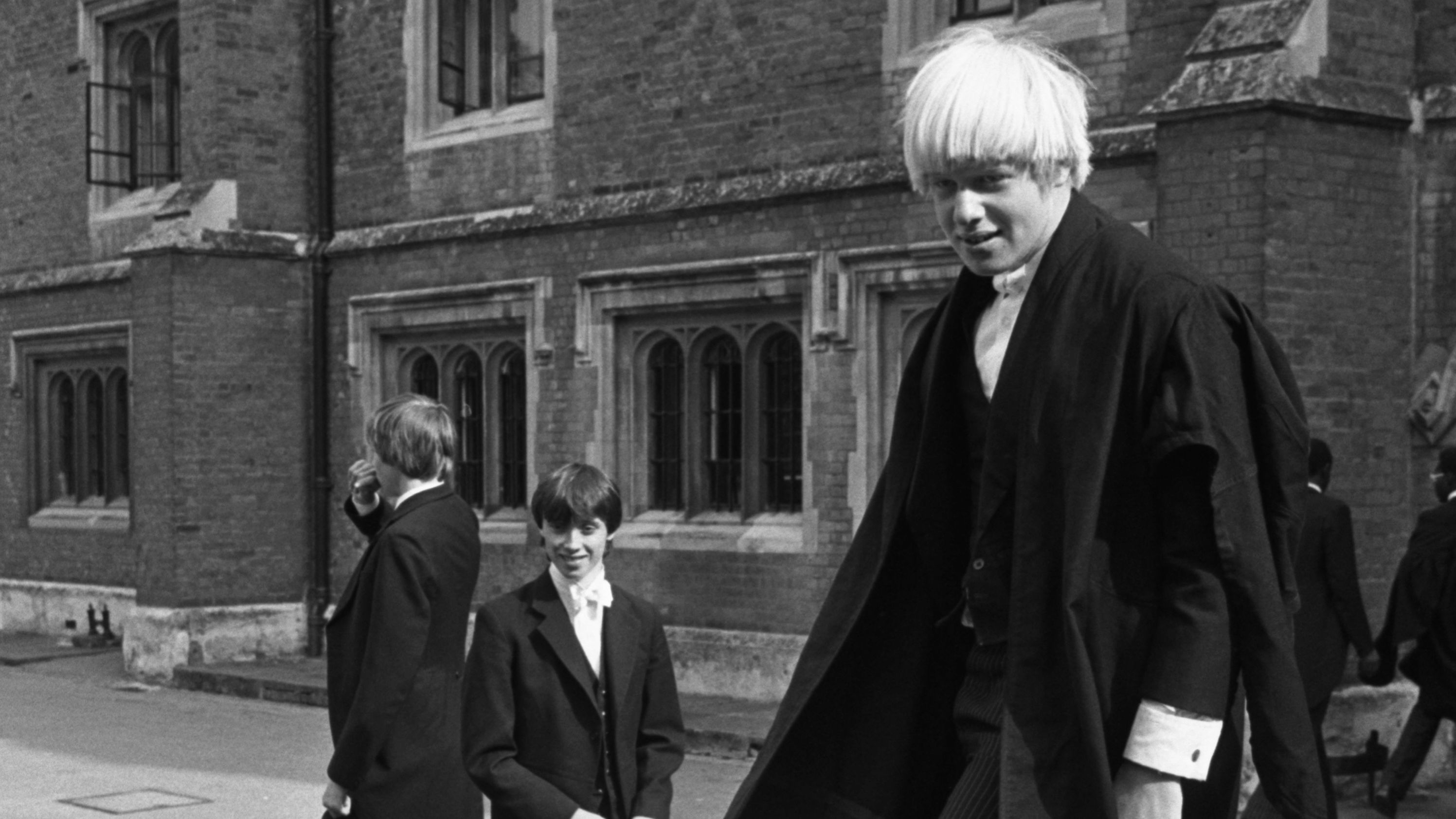 A 15-year-old Johnson, right, is seen outside Eton College, a boarding school outside London, in 1979.