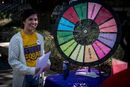 A Louisiana State University Street Squad peer educator shares information about safe sex practices with fellow students. 