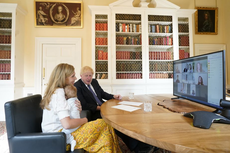 14/07/2020. London, United Kingdom. Boris Johnson and Carrie NHS Call.The Prime Minister Boris Johnson and his partner Carrie Symonds with their son Wilfred in the study of No10 Downing Street speaking via zoom to the midwifes that helped deliver their son at the UCLH. 