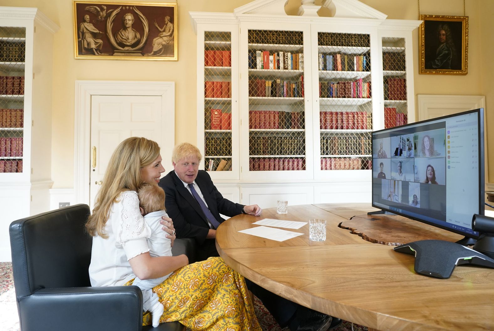 14/07/2020. London, United Kingdom. Boris Johnson and Carrie NHS Call.The Prime Minister Boris Johnson and his partner Carrie Symonds with their son Wilfred in the study of No10 Downing Street speaking via zoom to the midwifes that helped deliver their son at the UCLH.