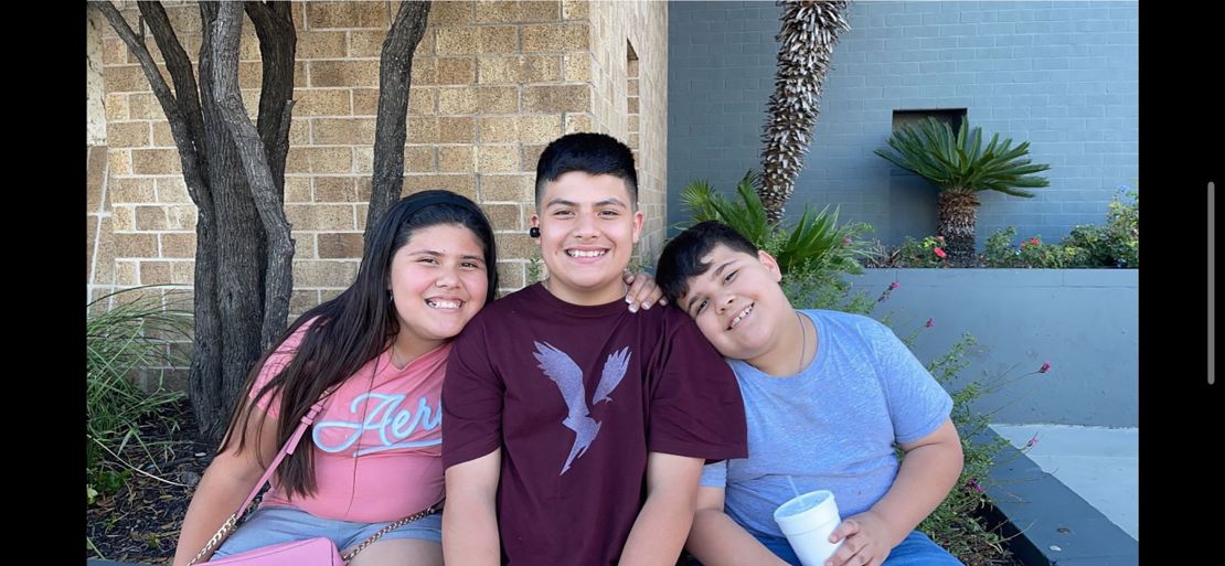 AJ Martinez, right, with his brother and sister.