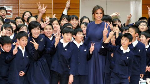 Akie Abe and Melania Trump meet school children during a visit to Kyobashi Tsukiji Elementary School in Tokyo on November 6, 2017.
