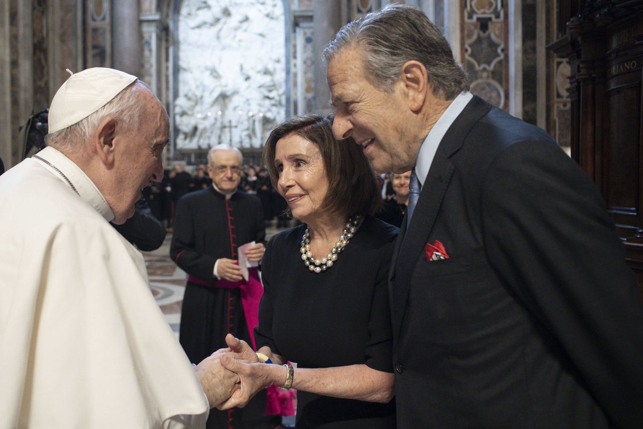 Francis greets US House Speaker Nancy Pelosi as he leads Mass at the Vatican in June 2022.