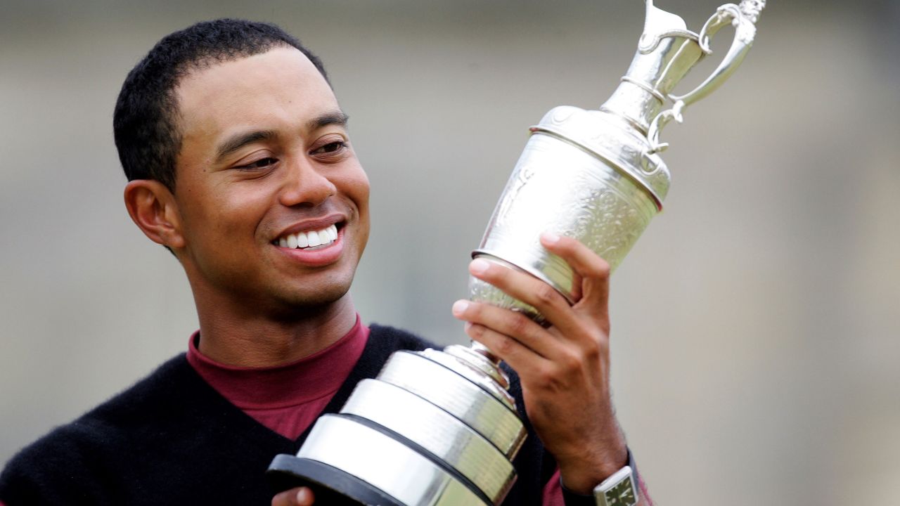 Woods celebrates after his second Open win at St. Andrews in 2005.