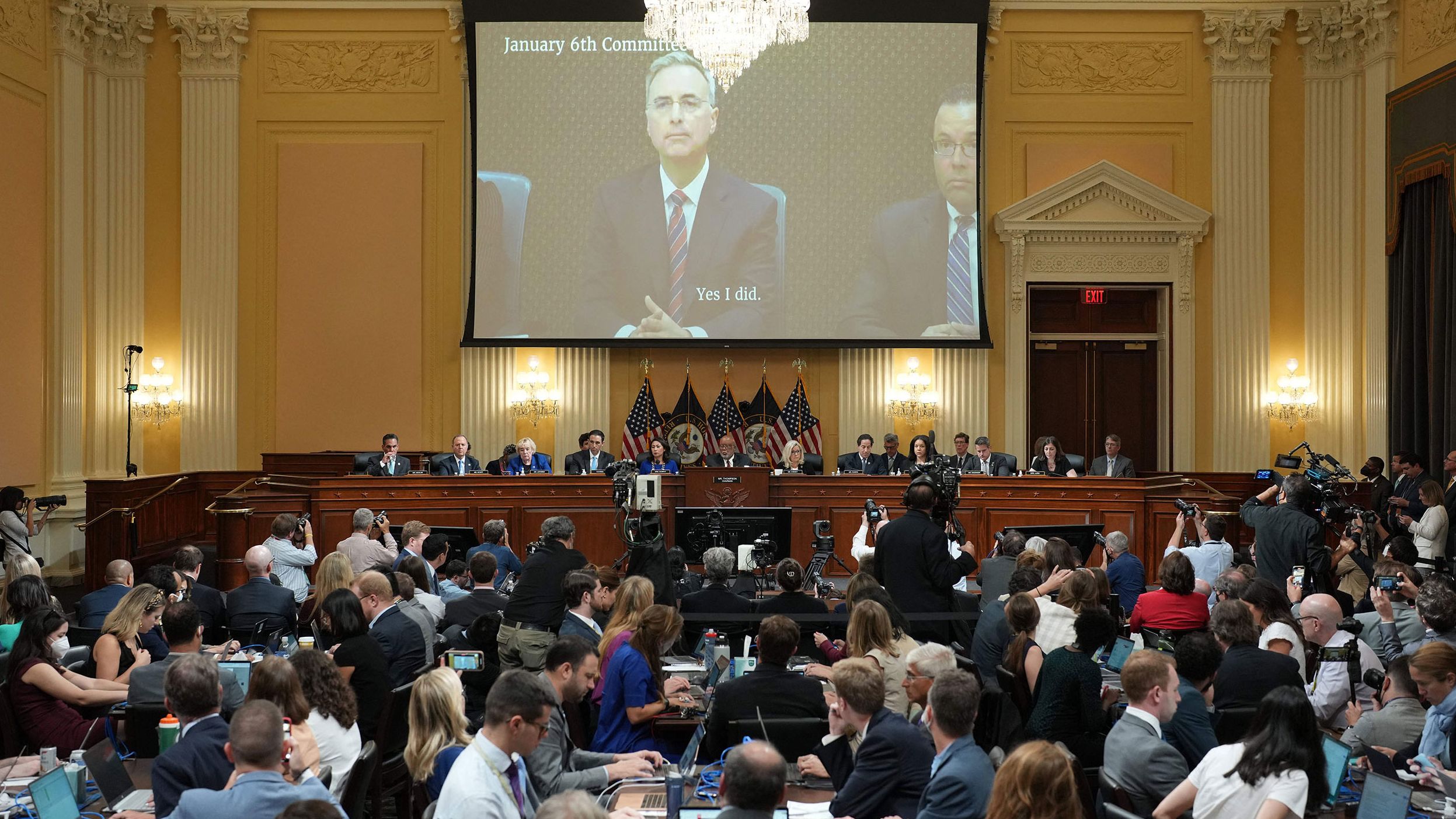 Recorded testimony of former White House counsel Pat Cipollone is shown over the House select committee during its hearing on July 12. <a href="index.php?page=&url=https%3A%2F%2Fwww.cnn.com%2Fpolitics%2Flive-news%2Fjanuary-6-hearings-july-12%2Fh_c5f1d3e815fbe90a3752e13260aba6a4" target="_blank">In the video footage,</a> Cipollone said he agreed with other Trump officials that there was not sufficient evidence of election fraud.