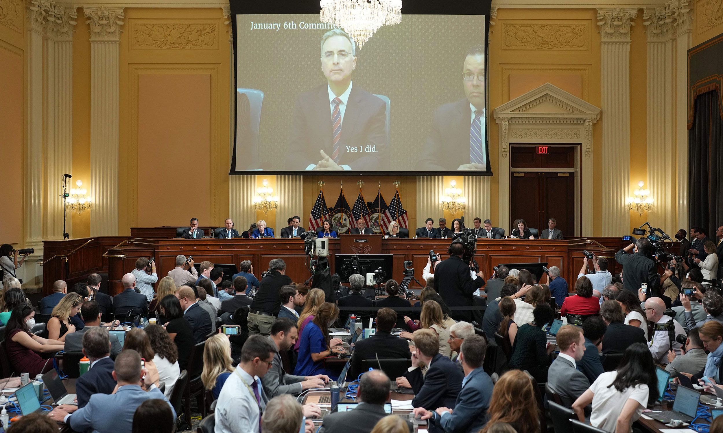 Recorded testimony of former White House counsel Pat Cipollone is shown over the House select committee during its hearing on July 12. <a href="index.php?page=&url=https%3A%2F%2Fwww.cnn.com%2Fpolitics%2Flive-news%2Fjanuary-6-hearings-july-12%2Fh_c5f1d3e815fbe90a3752e13260aba6a4" target="_blank">In the video footage,</a> Cipollone said he agreed with other Trump officials that there was not sufficient evidence of election fraud.