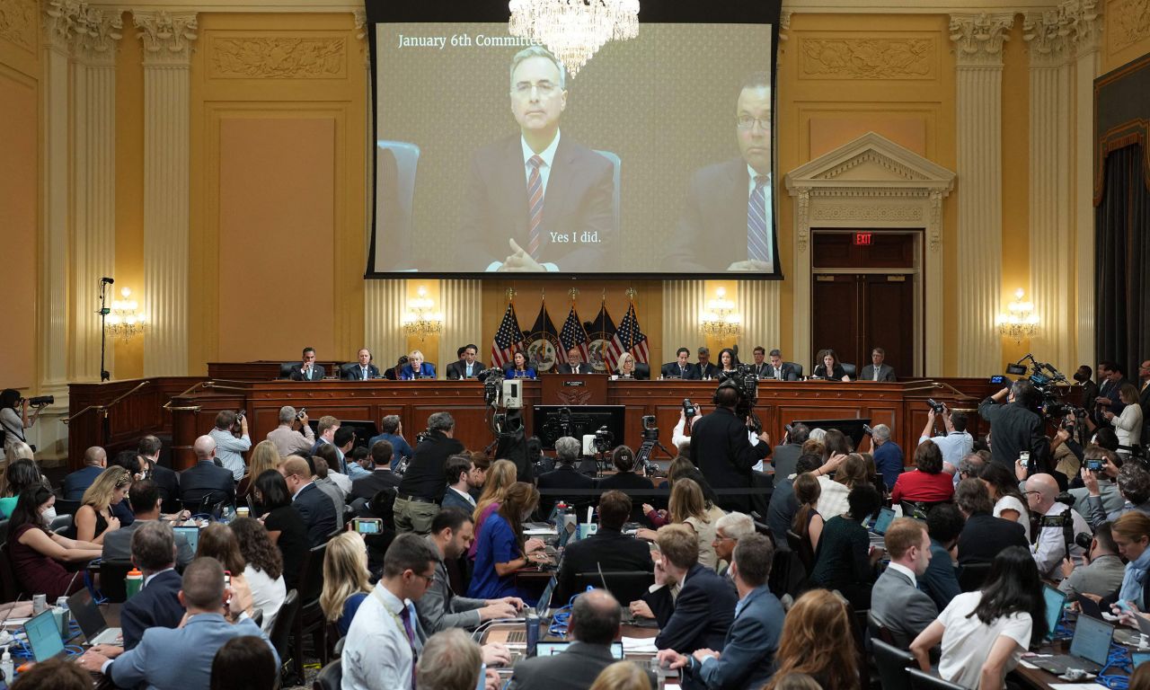 Recorded testimony of former White House counsel Pat Cipollone is shown over the House select committee during its hearing on July 12. <a href=