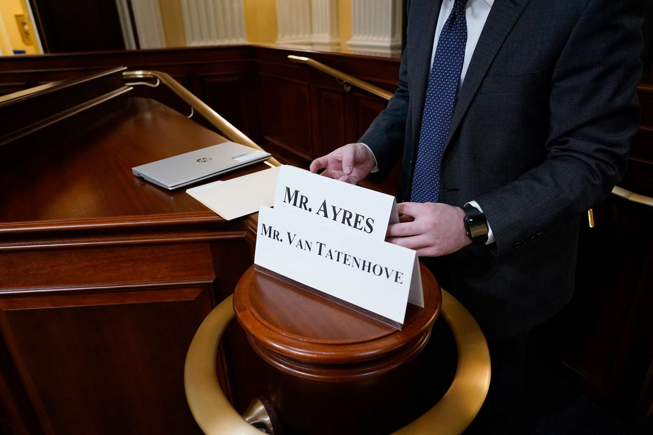 Name placards for Van Tatenhove and Ayres are prepared before their testimony on July 12.