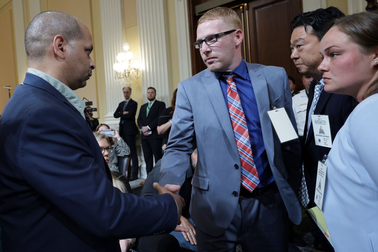 Stephen Ayres, second from left, shakes hands with Gonell after giving testimony to the committee. Ayres was one of the Capitol rioters on January 6. Gonell was one of the officers who defended the Capitol that day, and we learned that the injuries he suffered in the attack <a href=