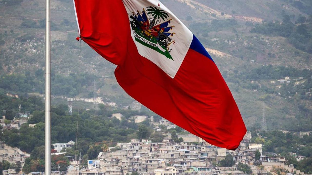 The Haitian flag waves over the Champ de Mars in Port-au-Prince, Haiti, on June 21, 2022.