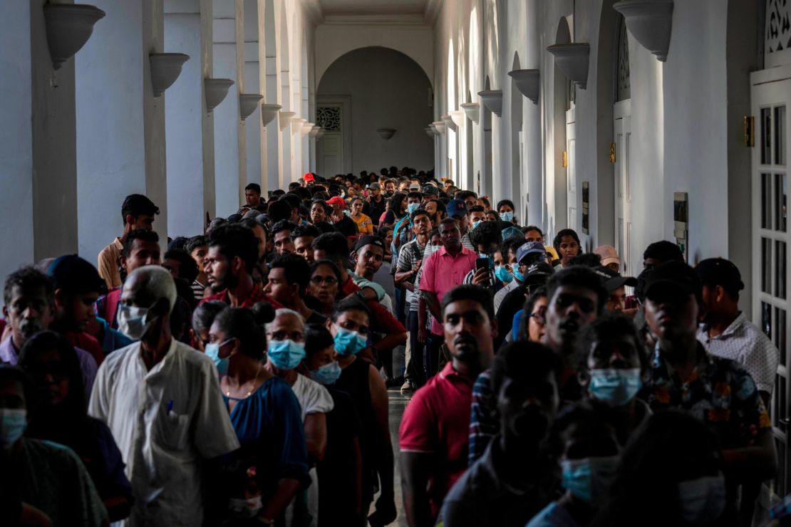 People throng President Gotabaya Rajapaksa's official residence three days after it was stormed by anti government protesters in Colombo, Sri Lanka, on July 12.