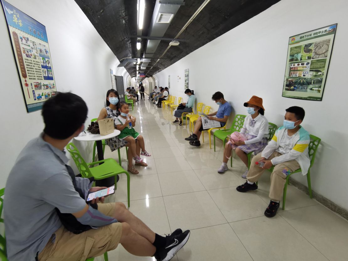 People escape the heat by heading to an air raid shelter in Nanjing, China, on July 10.