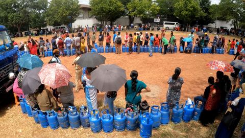Sri Lankans wait in line for gas cylinders in Colombo.