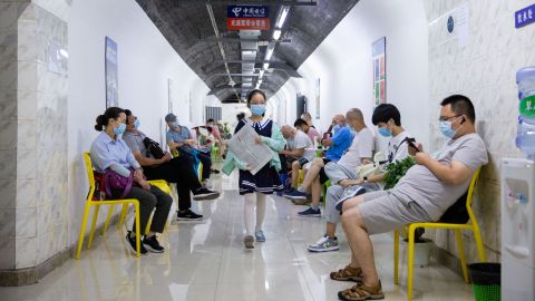 Residents spend their time in an air-raid shelter to escape summer heat amid a heat wave warning in Nanjing, Jiangsu province on July 12.